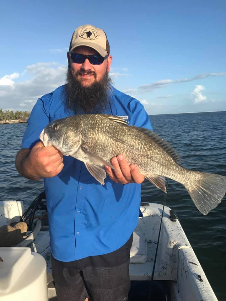 Man Holding Very Large Fish on Marco Island Charter